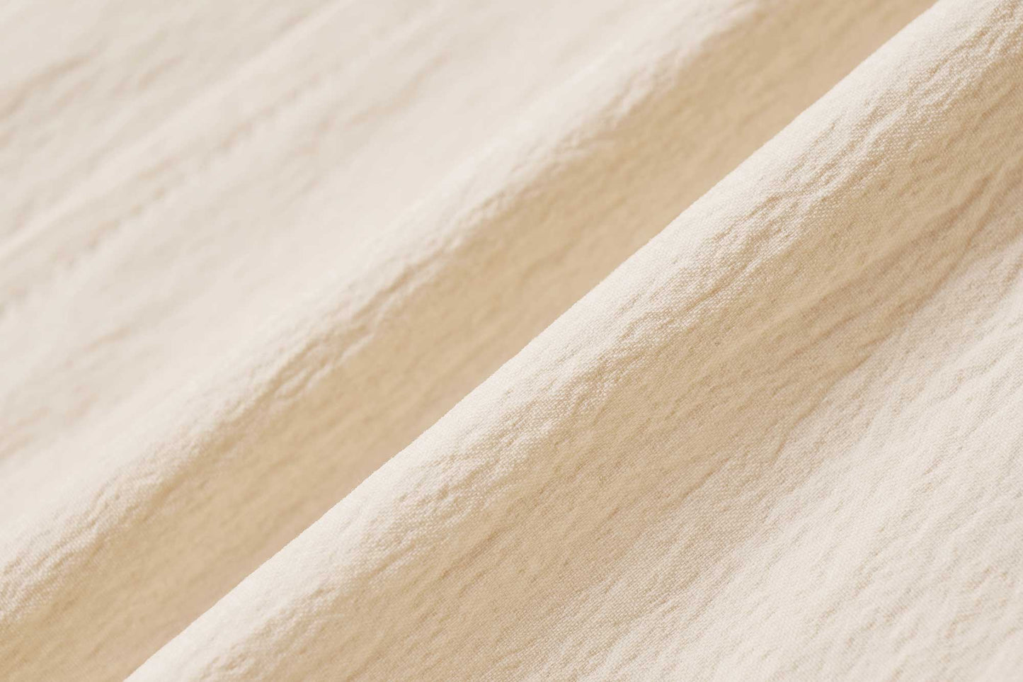 fabric detail of warm yellow shorts