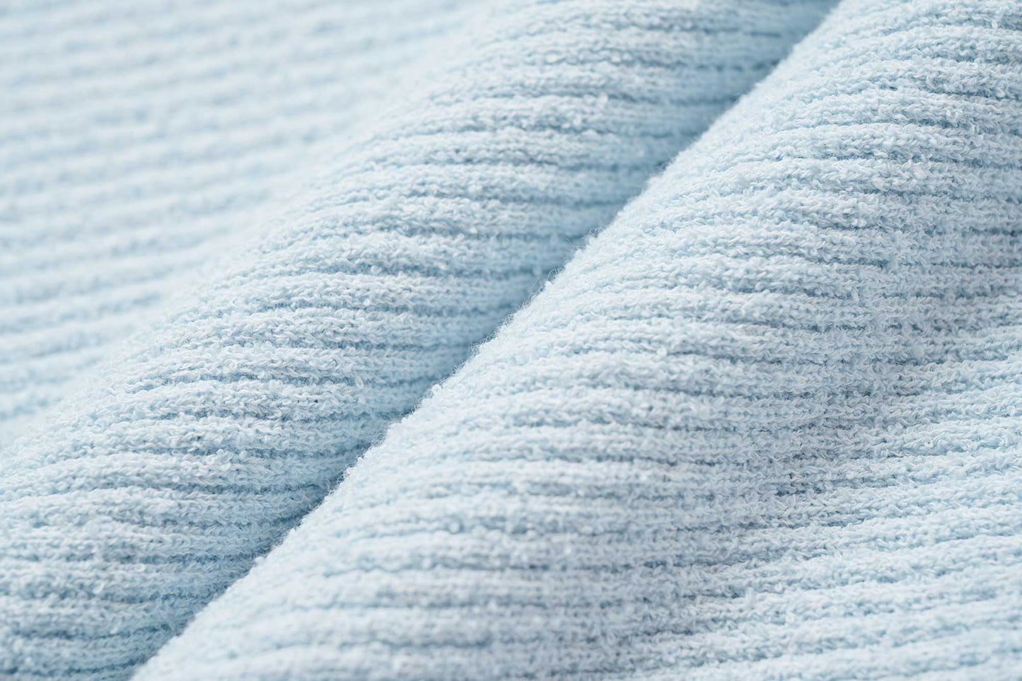 fabric detail of blue tank