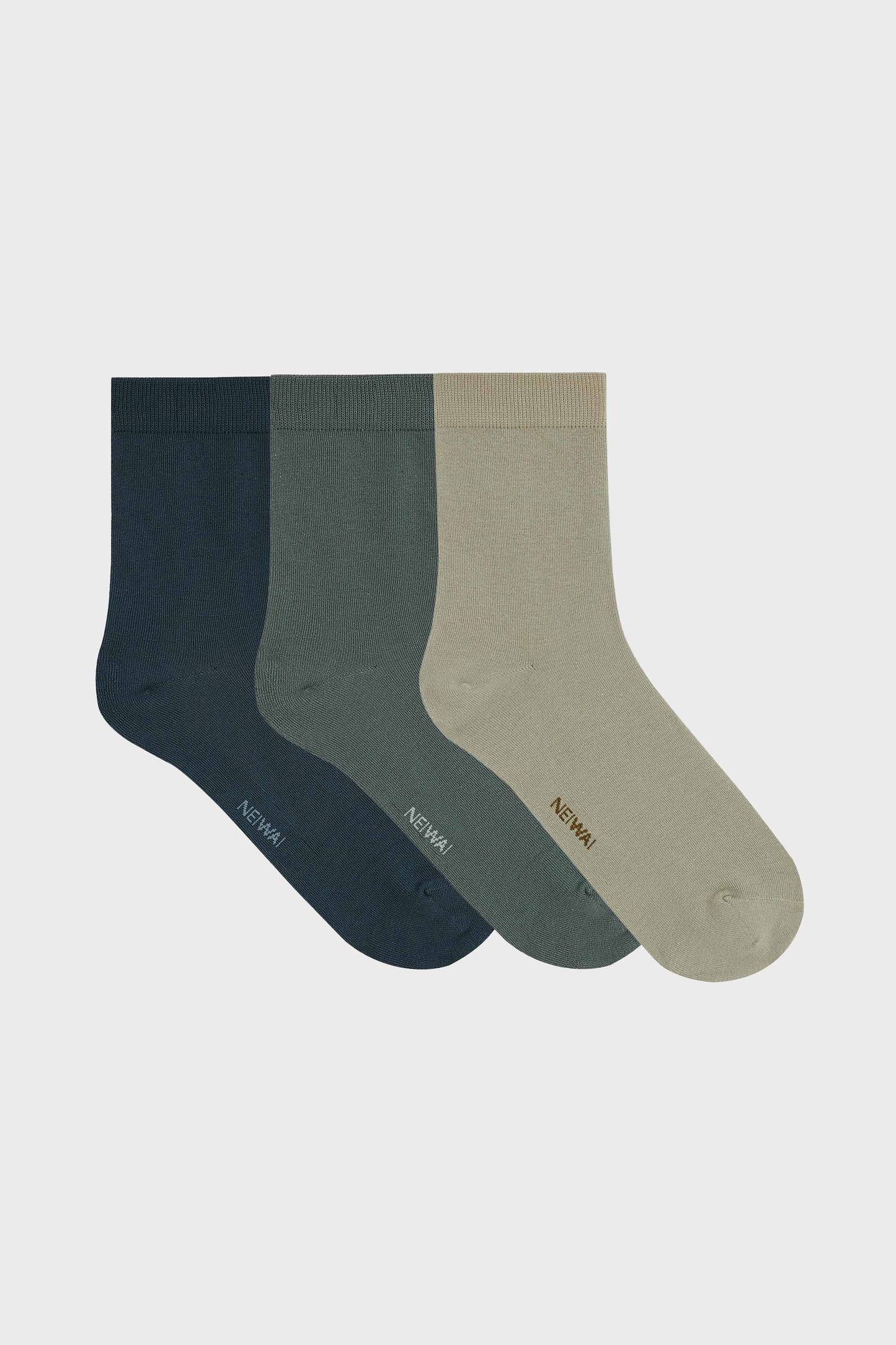three pack of men's mid calf socks include navy, dark green and green color