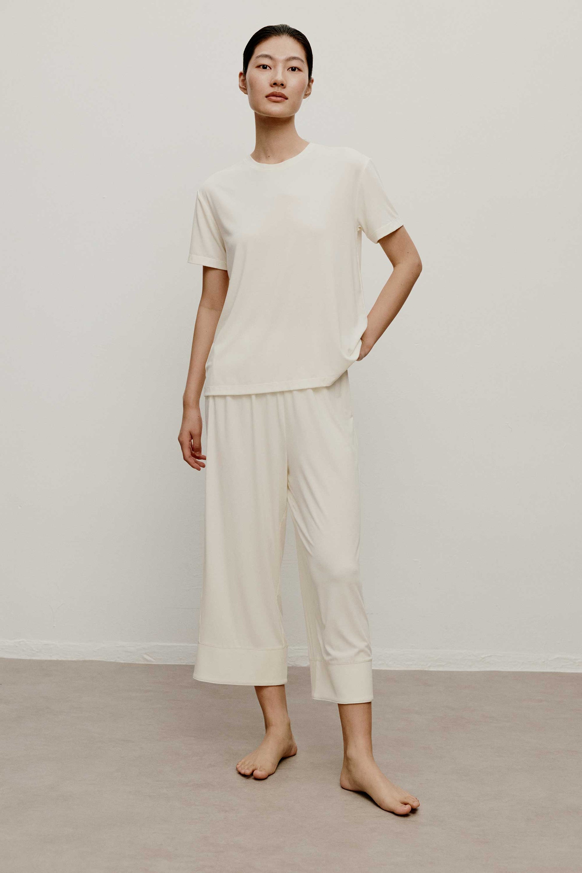 woman in white T-Shirt and pants