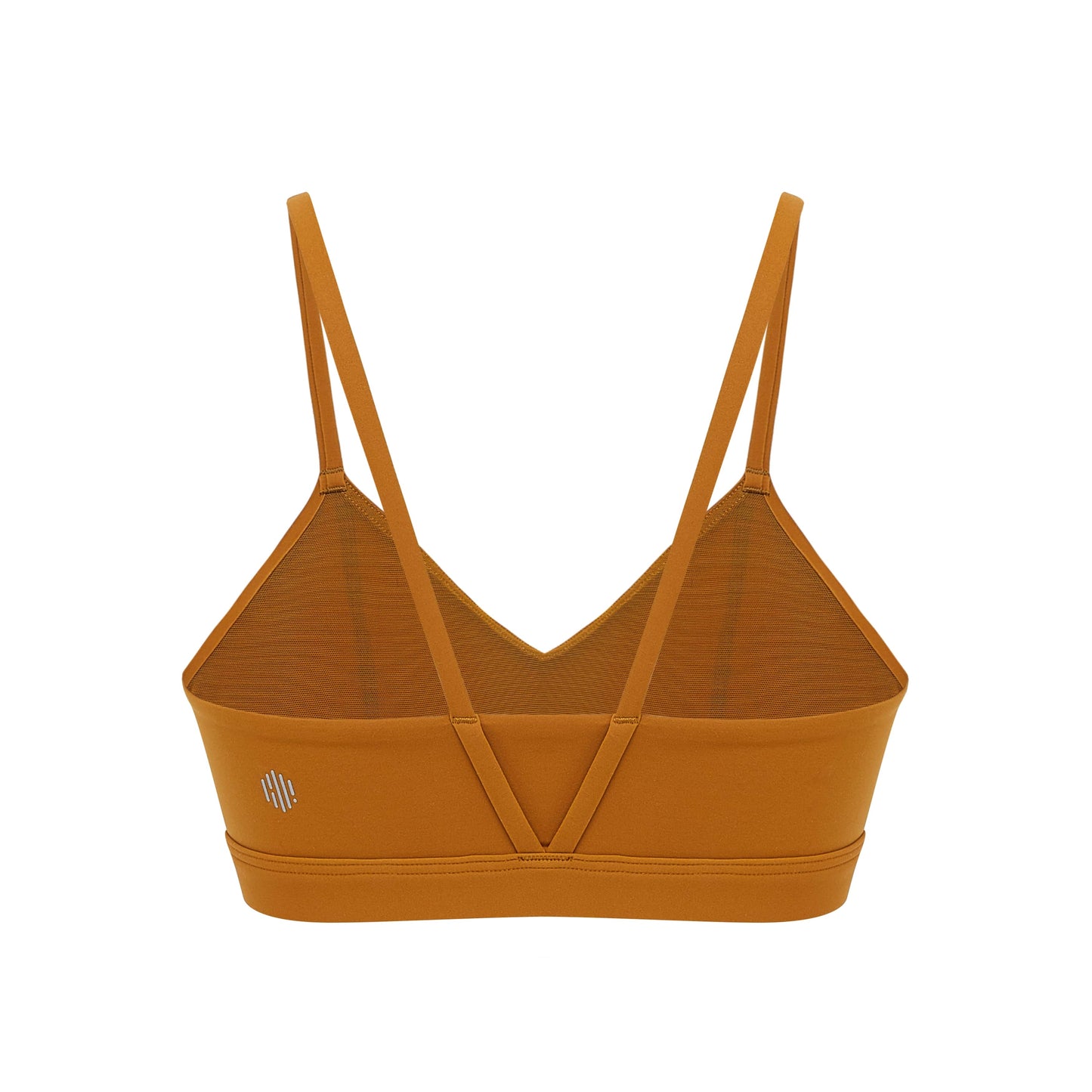 Flat lay of inside of golden brown sports bra