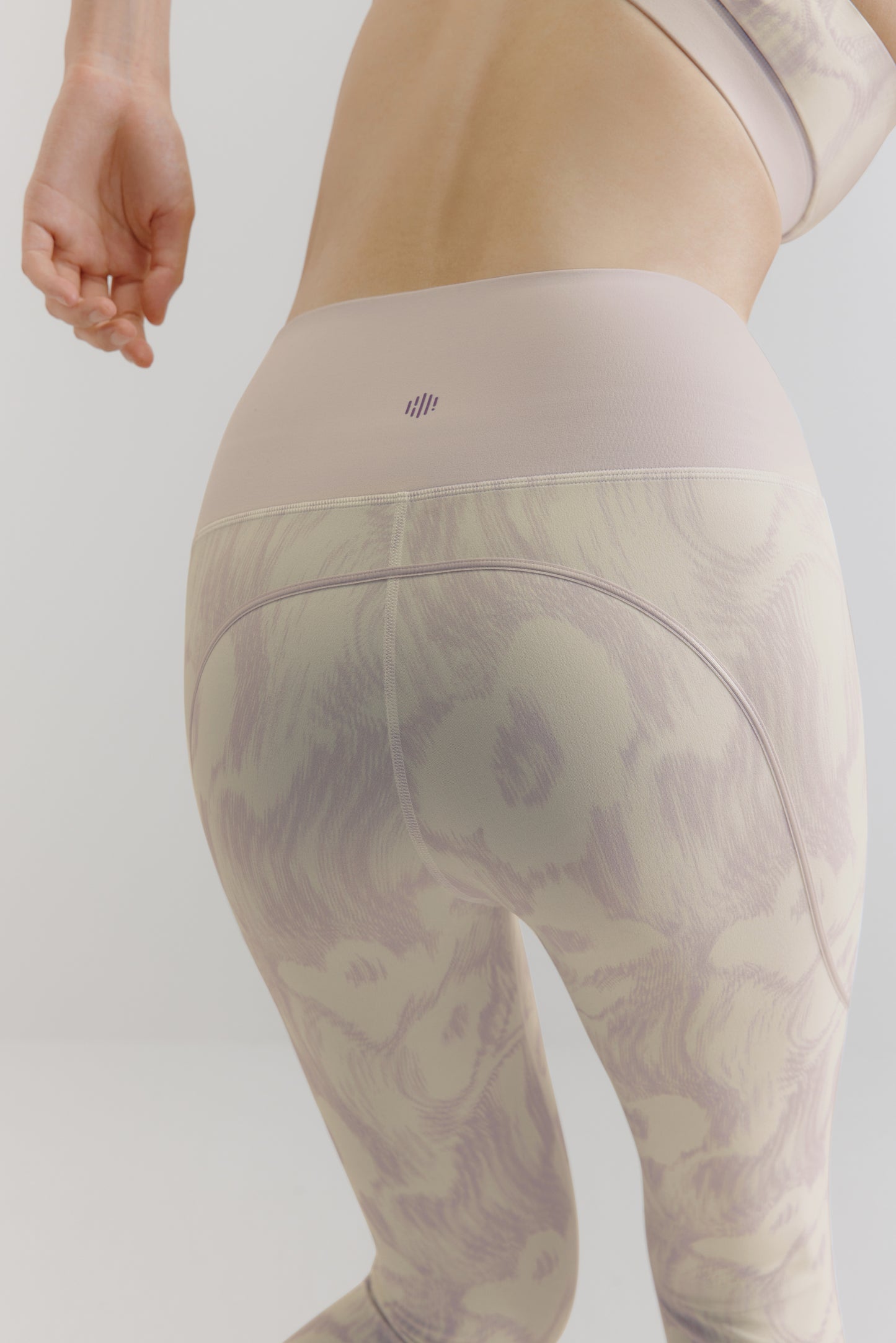 a purple and white patterned leggings.