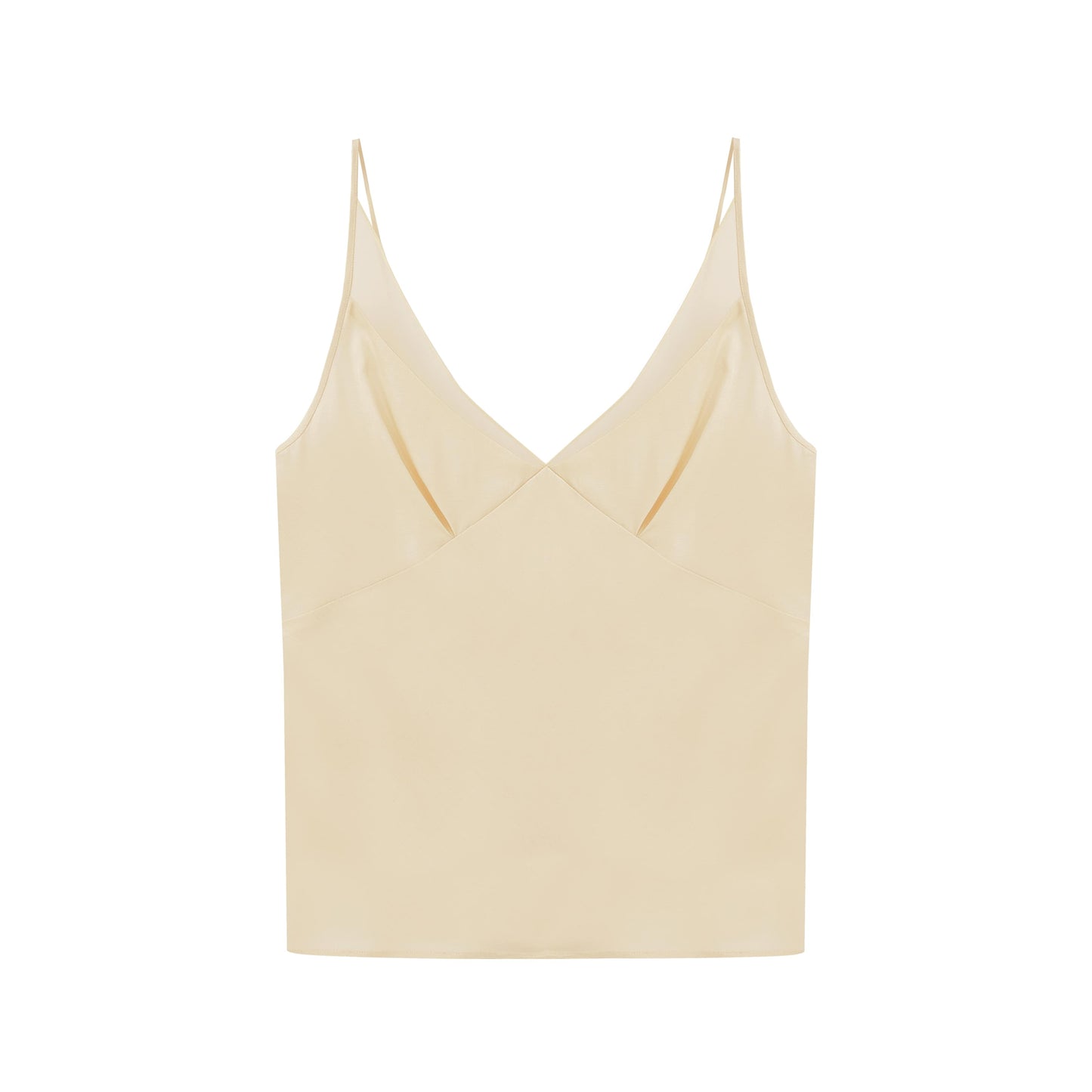 Flat lay cream-colored silk blend pajama top.