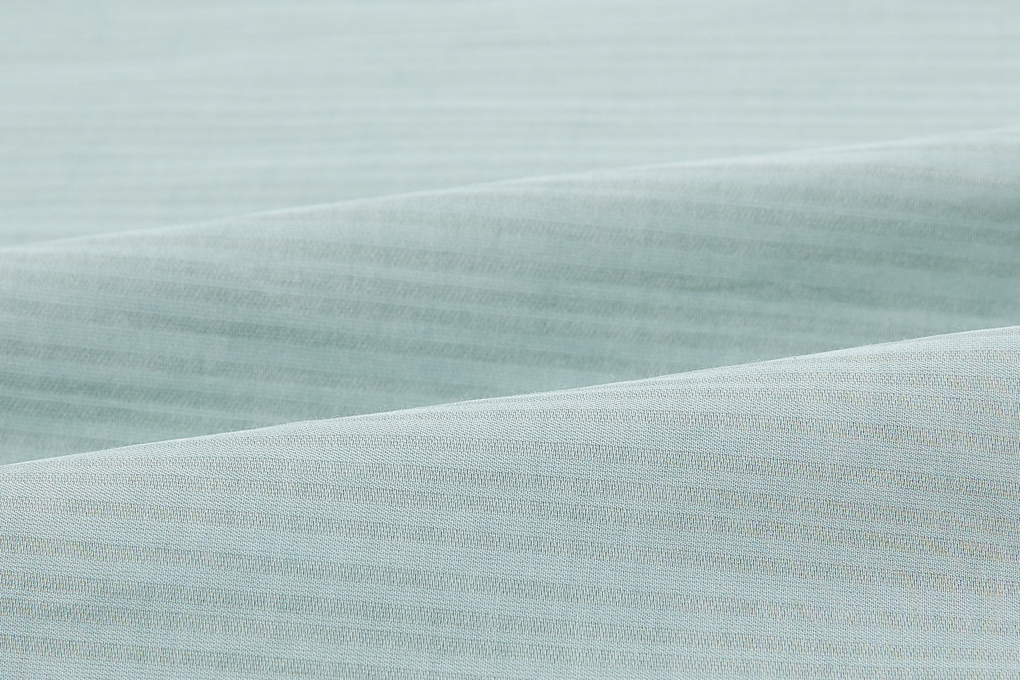 Closeup of seafoam green fabric