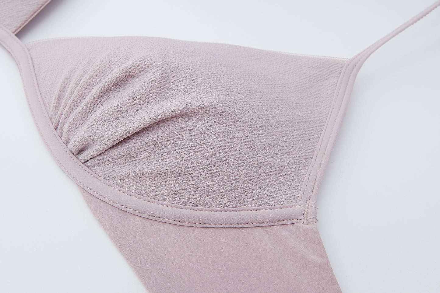 close up view of the flat lay of the light purple bra