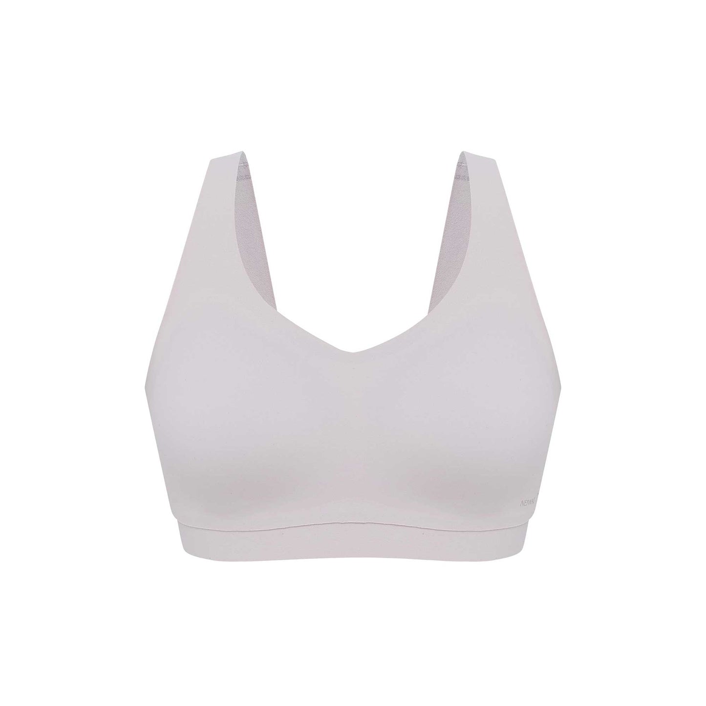 flat lay of an off white bra