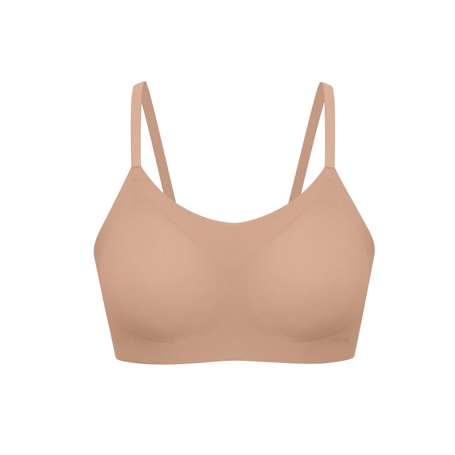 Flat lay of spaghetti strap bra in tan
