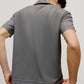 back of grey polo shirt
