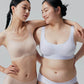 Two models wearing Barely Zero bra and brief set.