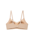 A beige wireless underwire bra with adjustable shoulder straps, displayed flat against a solid white background. Toasted Almond