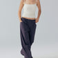 Model wearing white camisole top and cargo pants