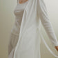 women in white ribbed cardigan and pajamas set