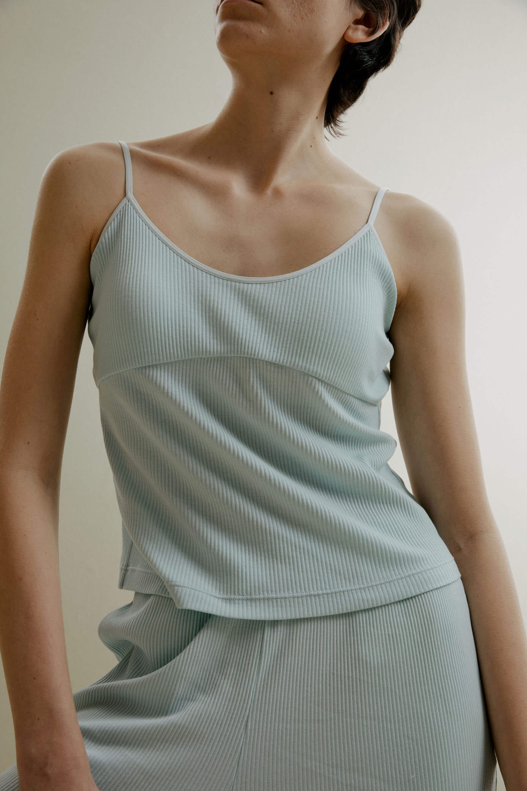 women in pale blue U-neck padded camisole