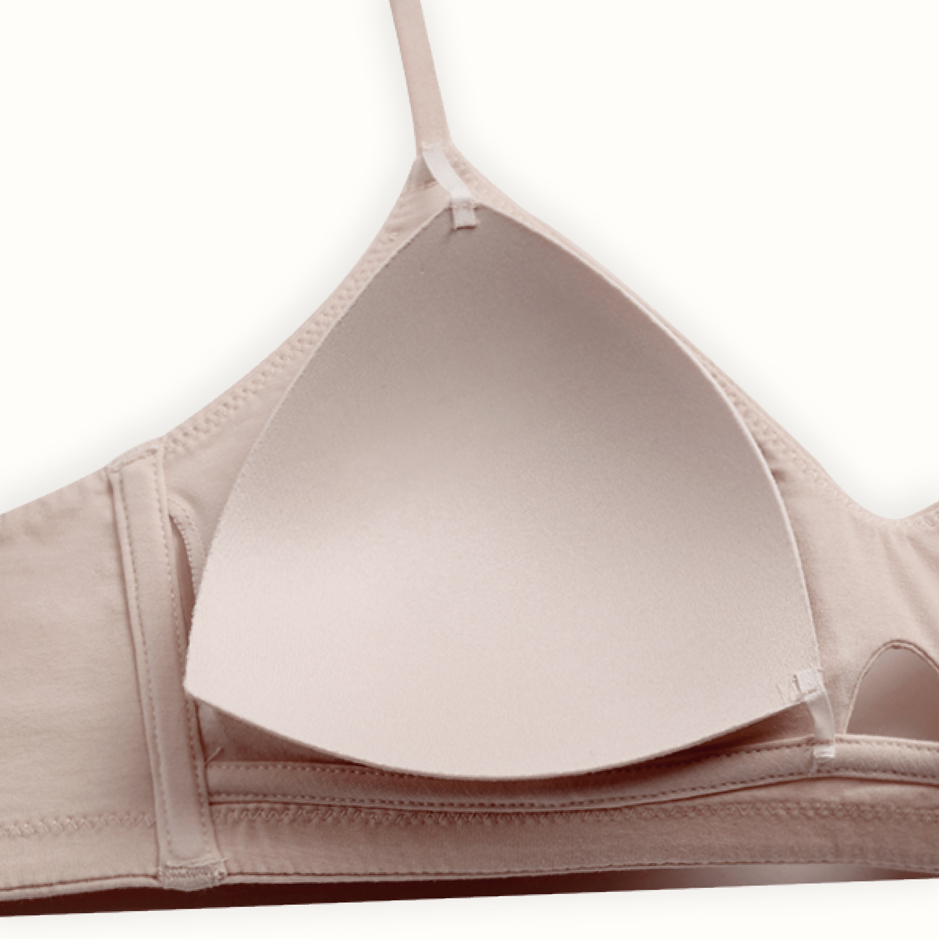 Beige bra on a white background