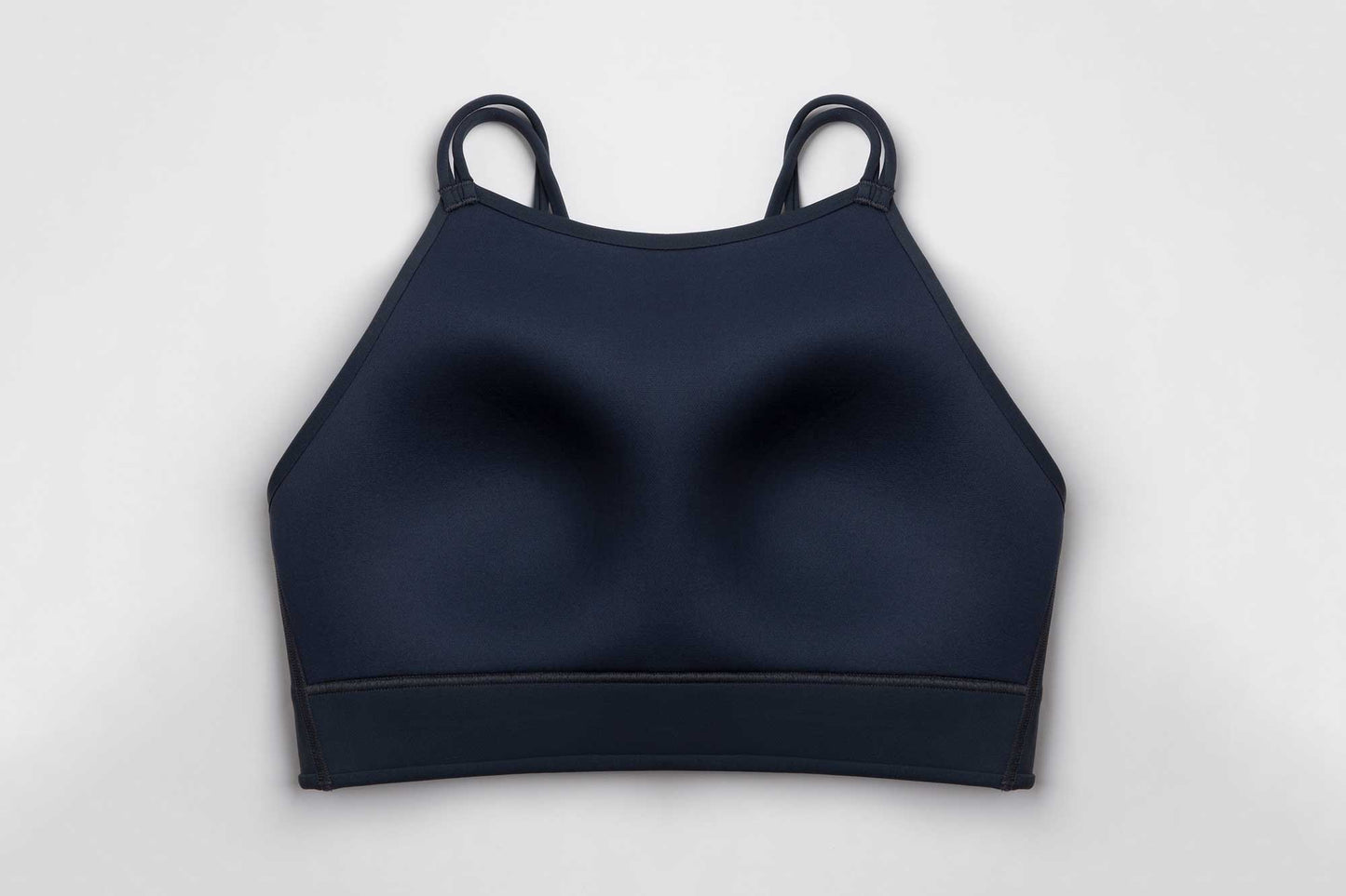 flat lay showing inside the  black sports bra.