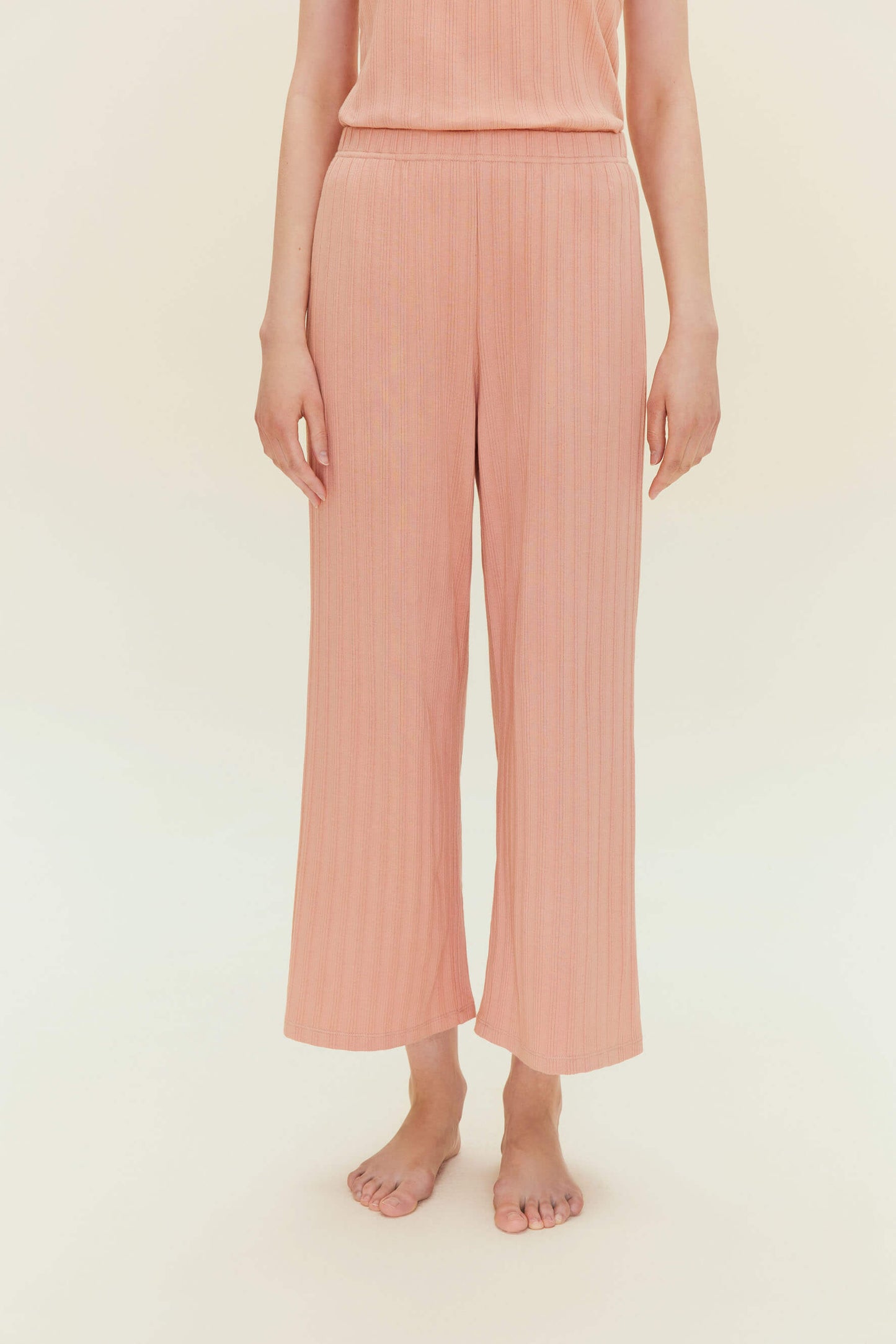 woman in pink lounge pants