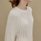 side of women in white ribbed sweater