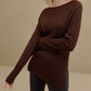 woman in brown sweater