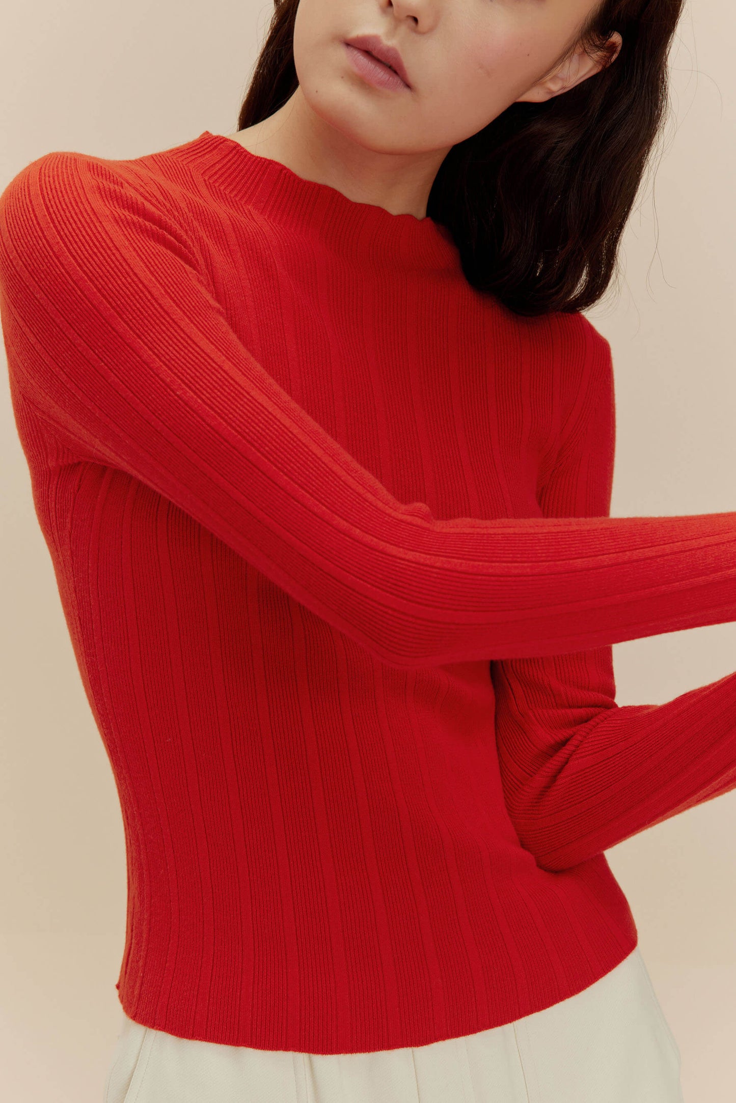 woman in red sweater 