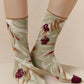 women in green pattern cotton socks