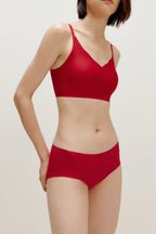 woman in a red bra and a red brief