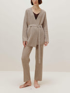 woman in knitted brown cardigan and pants