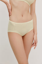  woman in cream brief