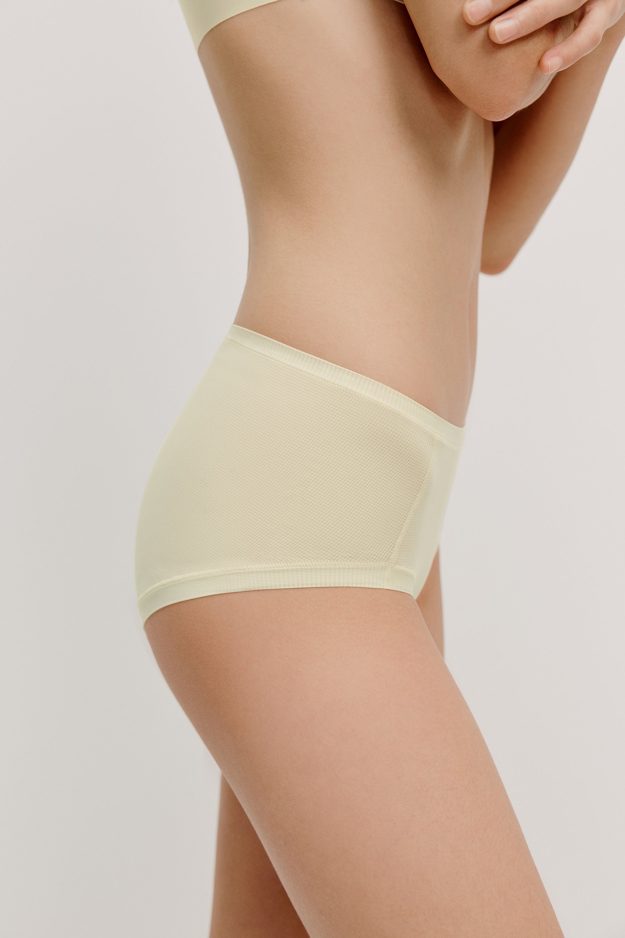 woman in cream brief