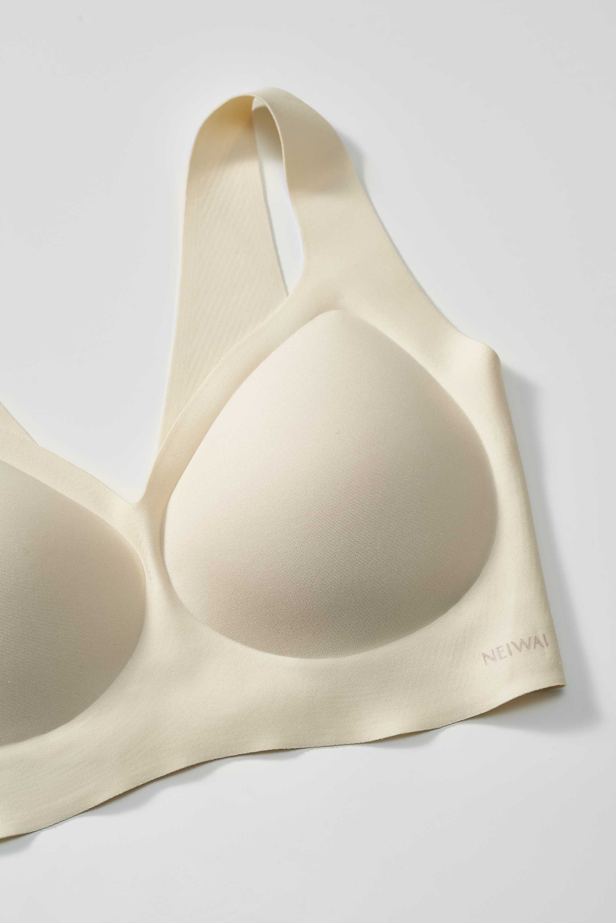 close up of a light yellow bra