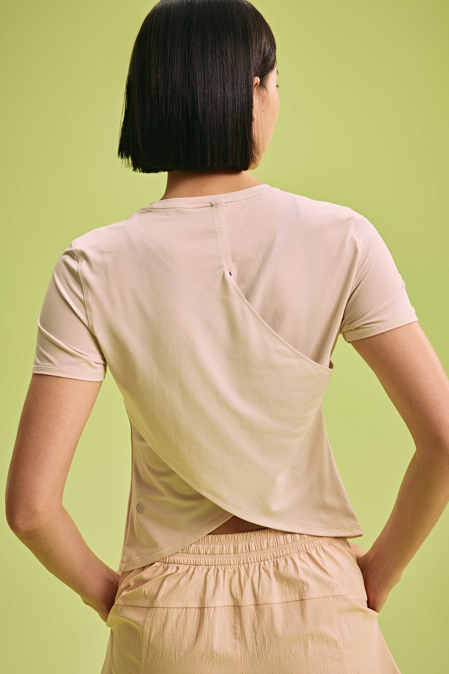 back of a woman wearing Cross-back T-Shirt