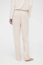 Back side of the cream pajama pants
