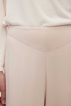 The pajama pants have a V-shaped design on the front