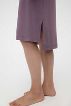 The lower part of a purple pajama dress