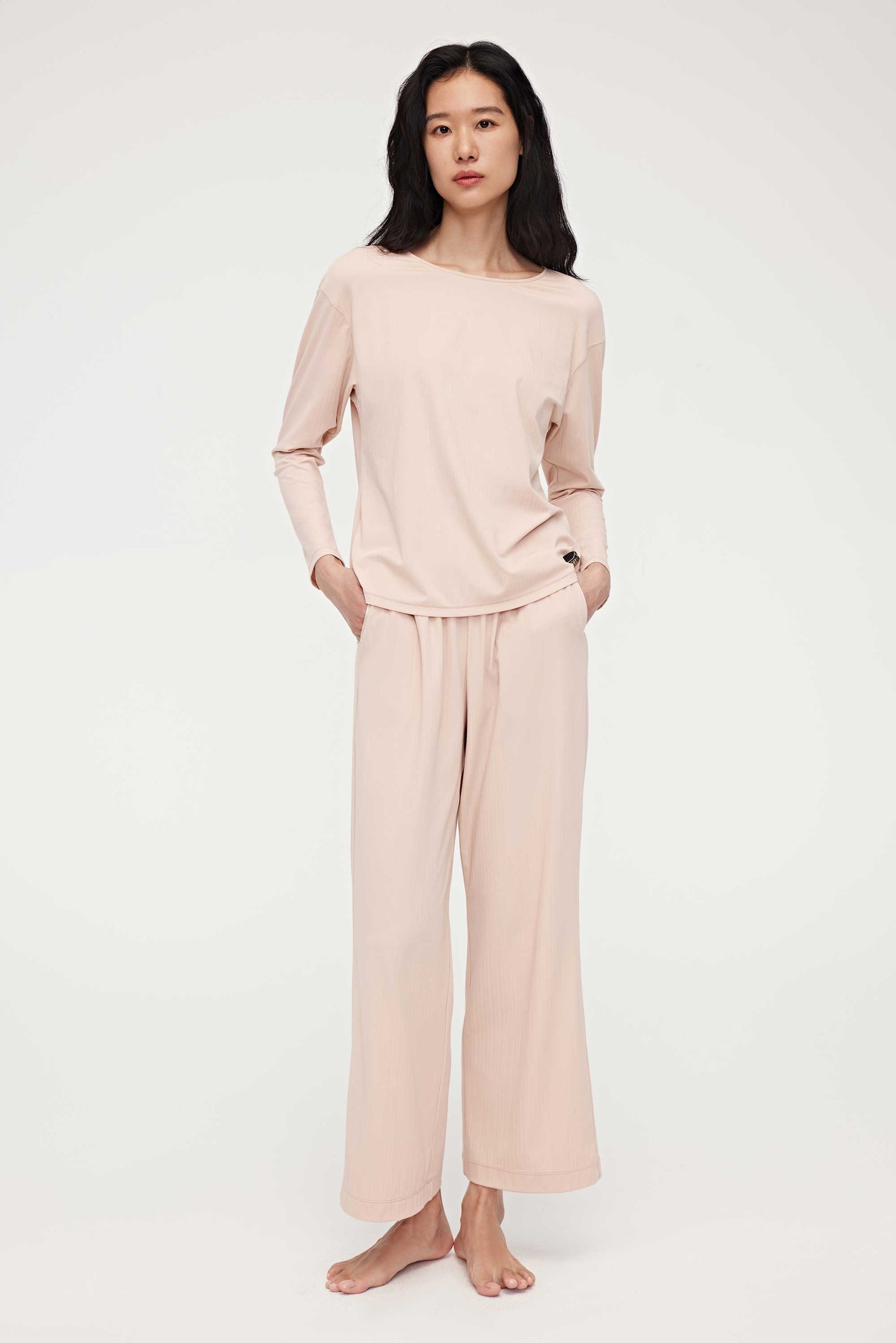 woman in pink lounge t-shirt and loung pants
