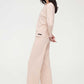 side look of woman in pink lounge t-shirt and loung pants
