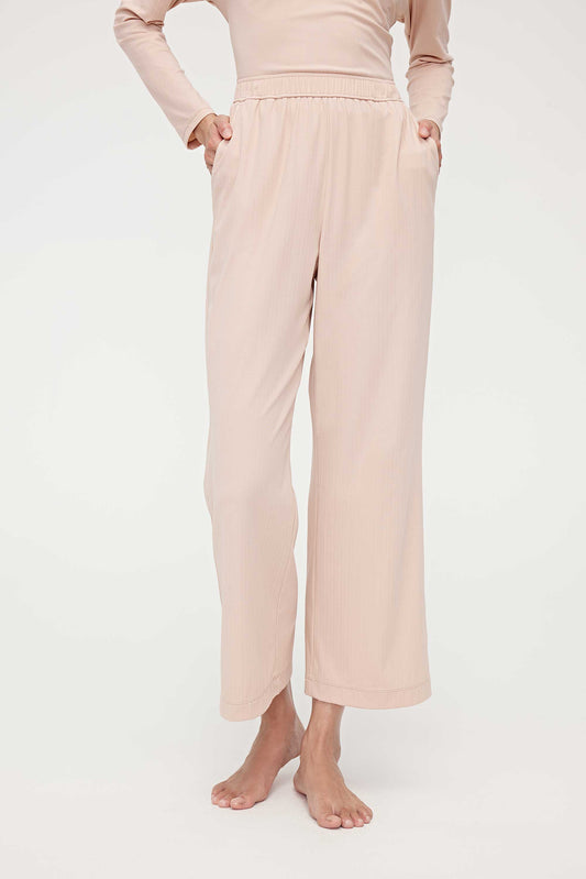 woman in pink lounge pants