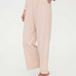 woman in pink lounge pants