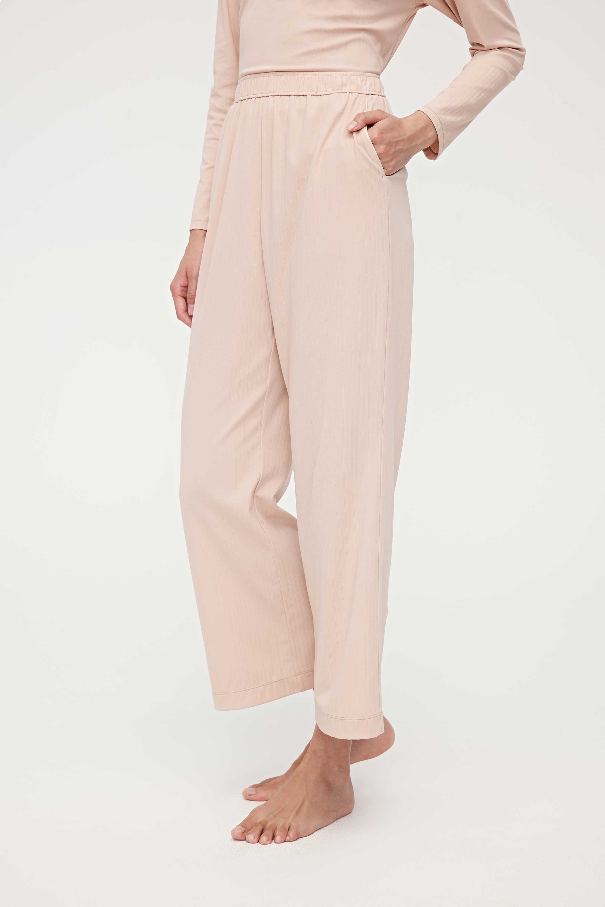 woman in pink lounge pants