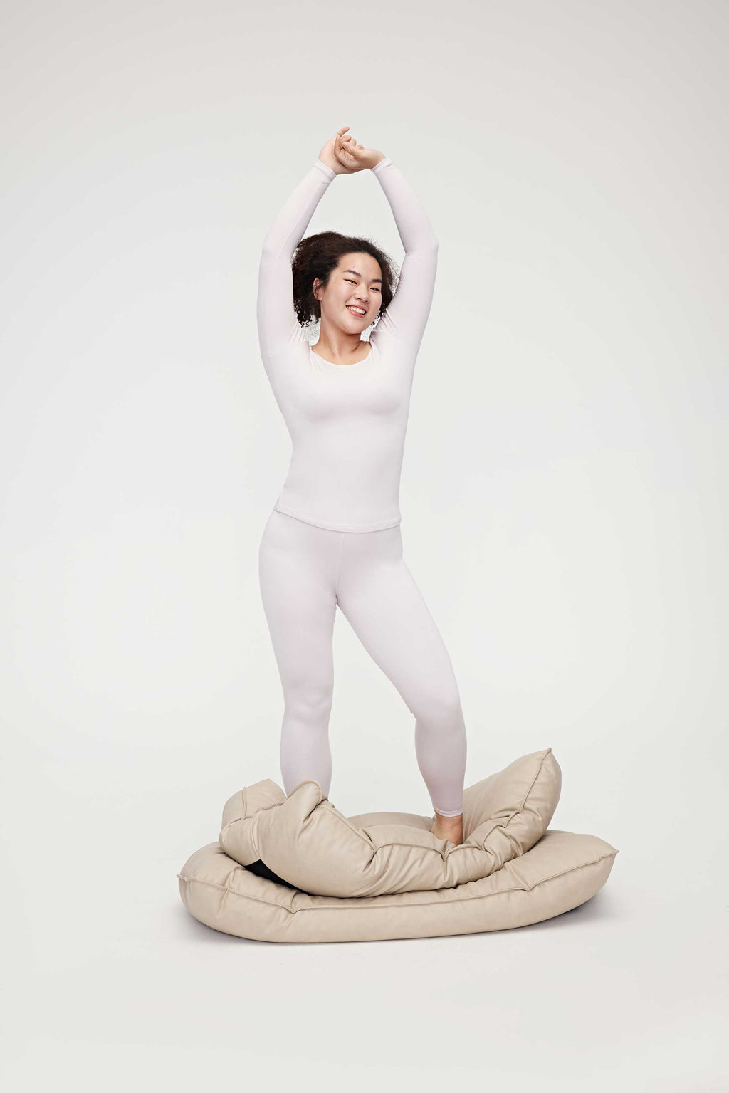 woman in light pink thermal wear set