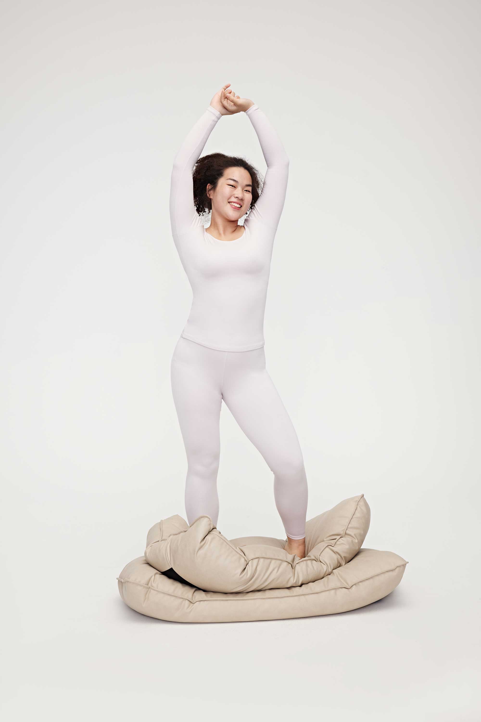 woman in light pink thermal wear set