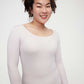 woman in light pink thermal top