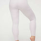 back of woman in light pink thermal pants