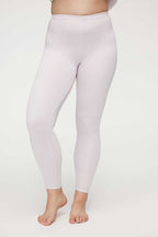 woman in light pink thermal pants