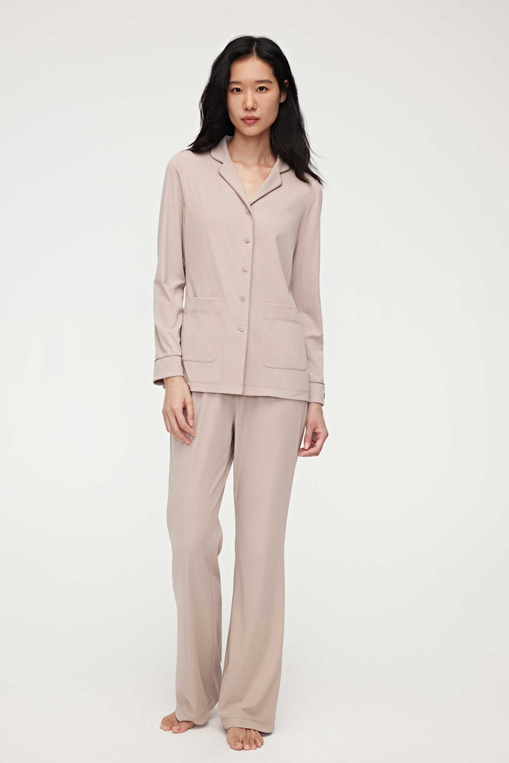 woman in coffee button up pajama set