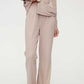 woman in coffee button up pajama set