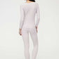 back of woman in light pink thermal wear set