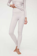 woman in light pink thermal wear set