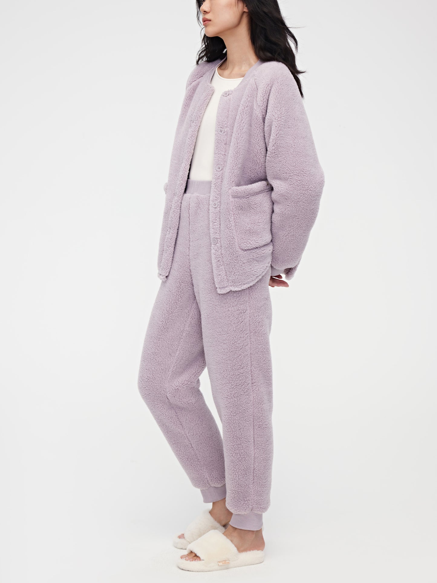 Woman wearing purple Fleece Pajama Set