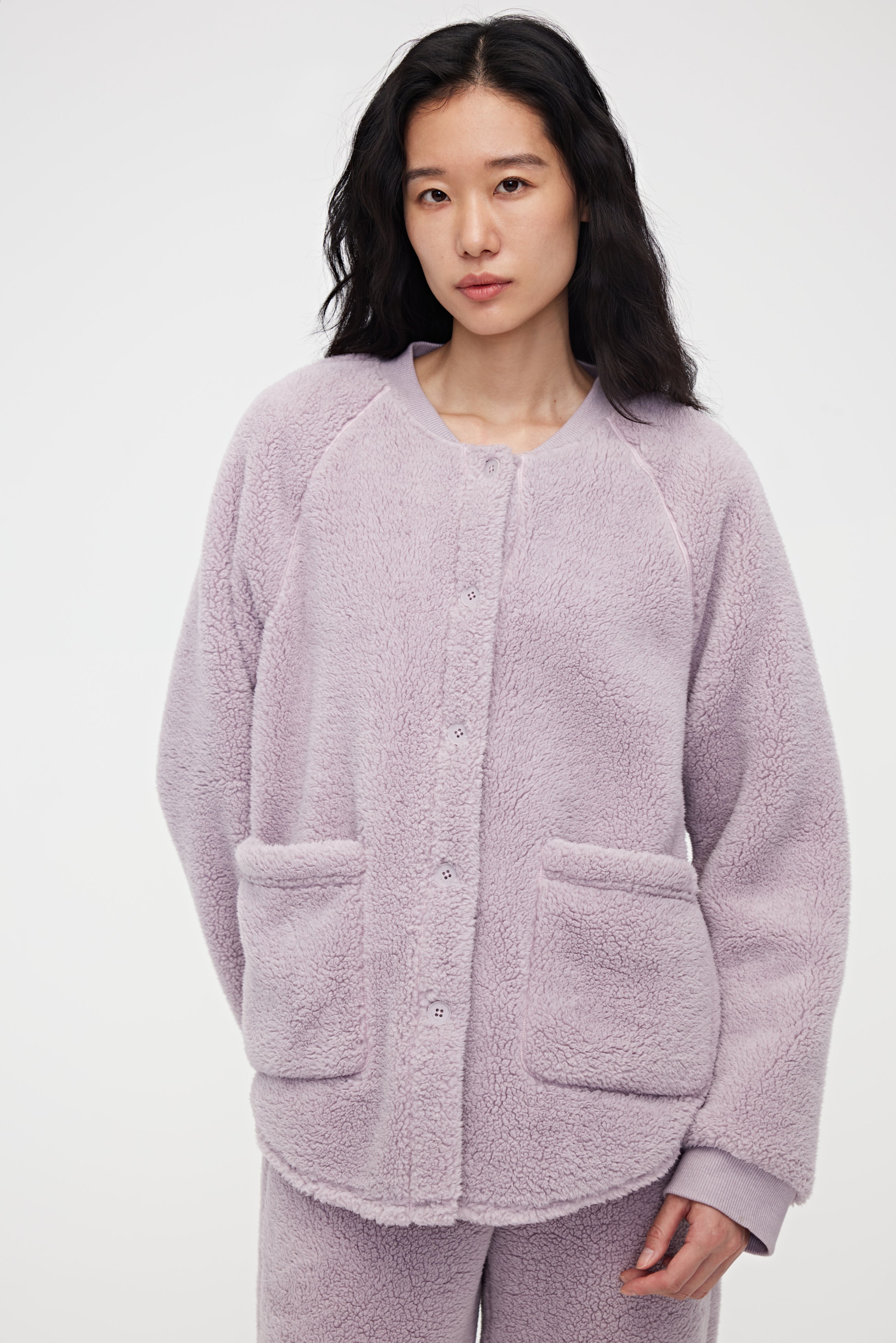 Woman wearing purple Fleece Pajama Top