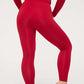 back of woman in red thermal pants